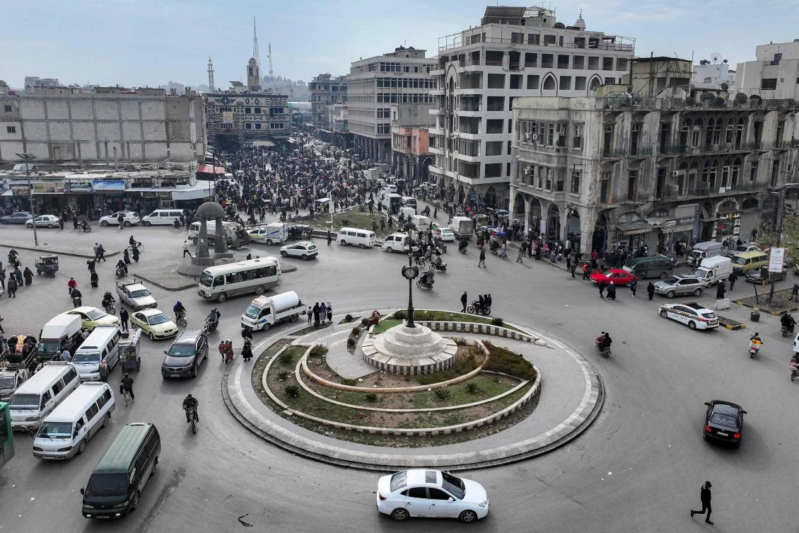 The roundabout of the Old Clock Tower along Quwatli Street in the Hamidiyah district of Homs can be seen on January 4, 2025. (AFP)