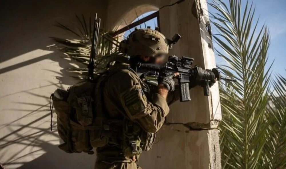 Troops of the Kfir Brigade operate in northern Gaza's Beit Hanoun, in a handout photo issued by the IDF on January 4, 2024. (Israel Defense Forces/File Photo))