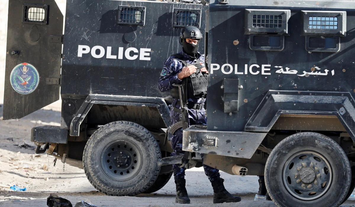 A police officer stands guard in Jenin camp in the Israeli-occupied West Bank, December 15, 2024. (REUTERS)