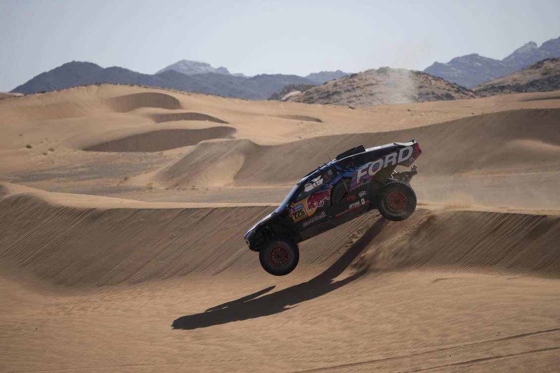 Driver Carlos Sainz and co-driver Lucas Cruz compete during the stage two, day One, of the Dakar Rally with start in Bisha and finish in Bisha, Saudi Arabia on Jan. 5, 2025. (AP)