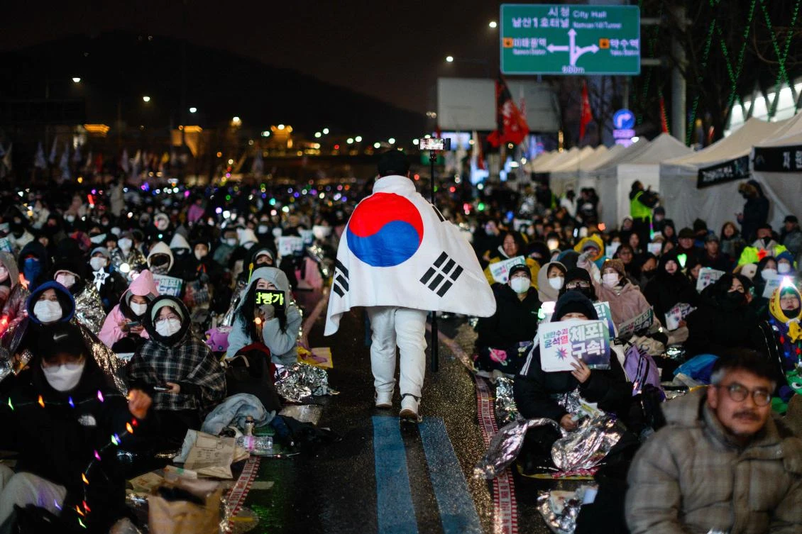 People take part in a rally against impeached South Korea’s President Yoon Suk Yeol near his residence in Seoul on January 5, 2025. (AFP)