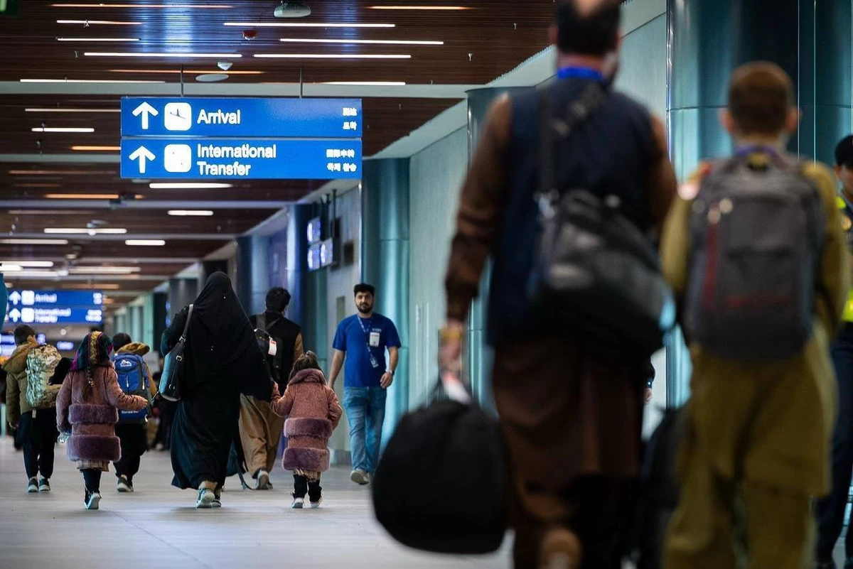Afghan nationals walk through the arrivals hall of the international airport in Manila on Jan. 6, 2025. (US Embassy in Manila)