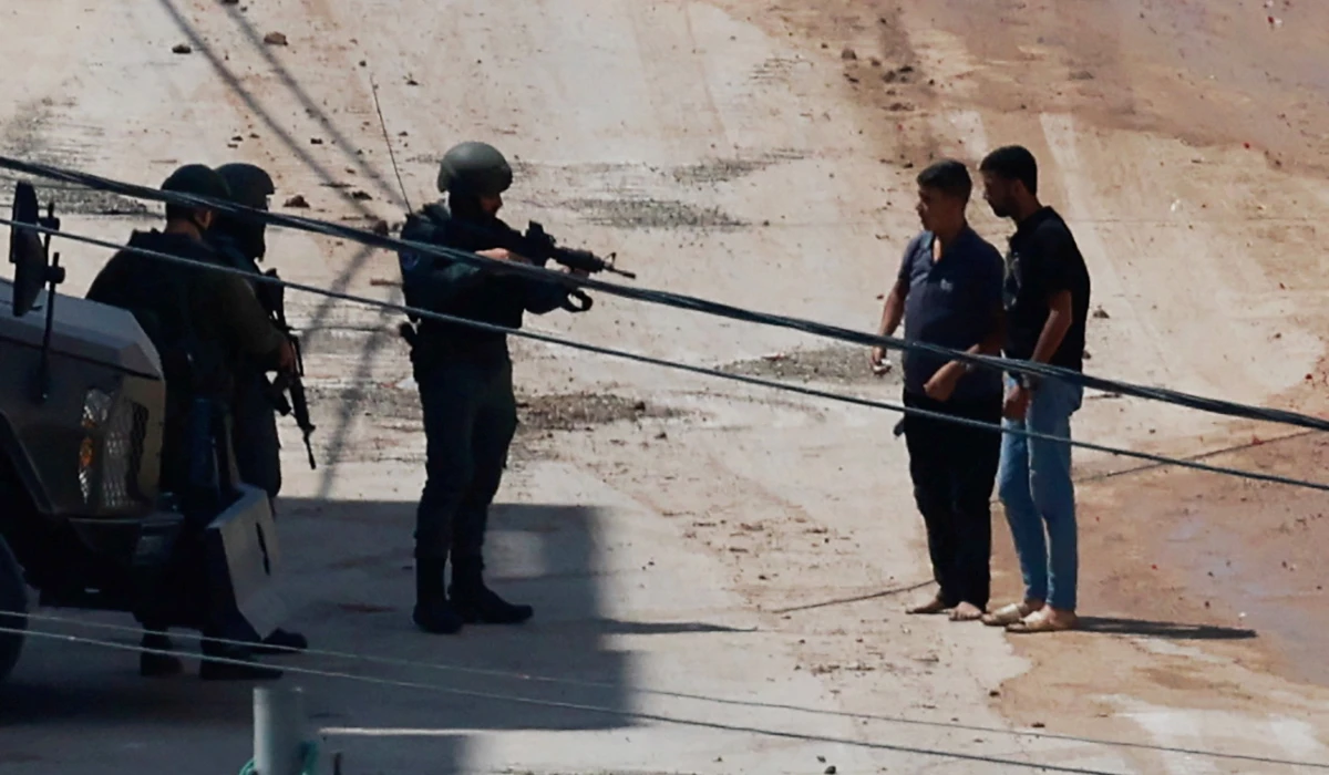 Palestinians are stopped by Israeli security forces, during an Israeli raid in Jenin, in the Israeli-occupied West Bank, August 31, 2024. (REUTERS)