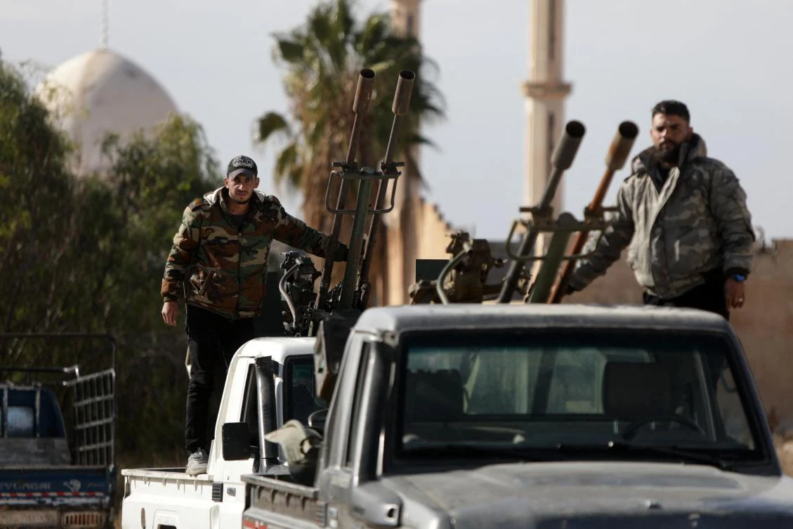Forces loyal to the new Syrian government gather in the town of Busra in Syria's southern Daraa province, on January 5, 2025. (AFP)