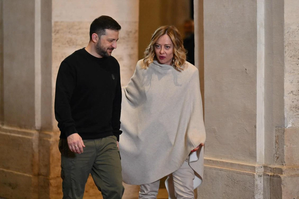 Italy’s Prime Minister Giorgia Meloni welcomes Ukraine’s President Volodymyr Zelensky before a meeting at Chigi palace in Rome on Jan. 9, 2025. (AFP)
