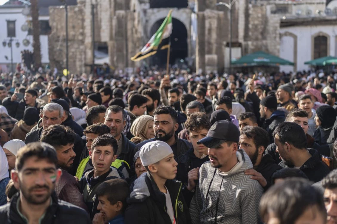 A crowd gathers outside the Umayyad Mosque as they await updates following a stampede that occurred during Friday prayers in Damascus, Jan. 10, 2025. (AP)