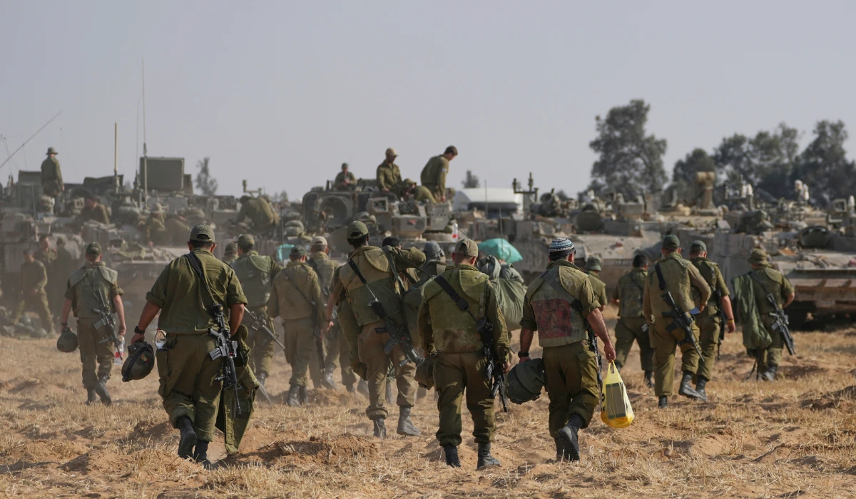 Israeli soldiers are seen at a staging ground near the border with the Gaza Strip, in southern Israel, Tuesday, April 30, 2024. (AP)