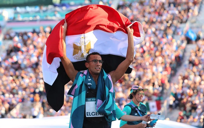 Ahmed Elgendy of Egypt celebrates winning the gold medal at the Paris 2024 Olympics — Modern Pentathlon — Men’s Final Laser Run — at Chateau de Versailles, Versailles, on Aug. 10, 2024. (Reuters)