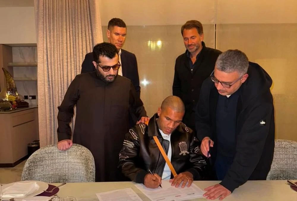 Conor Benn signs a contract to fight Chris Eubank Jr. (X/@EddieHearn)