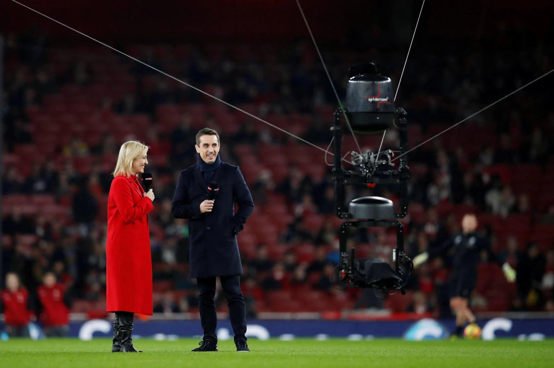 General view of a spider cam and presenters Kelly Cates and Gary Neville before the English Premier League match between Arsenal and Liverpool — Emirates Stadium, London, Dec. 22, 2017. (Reuters/File)