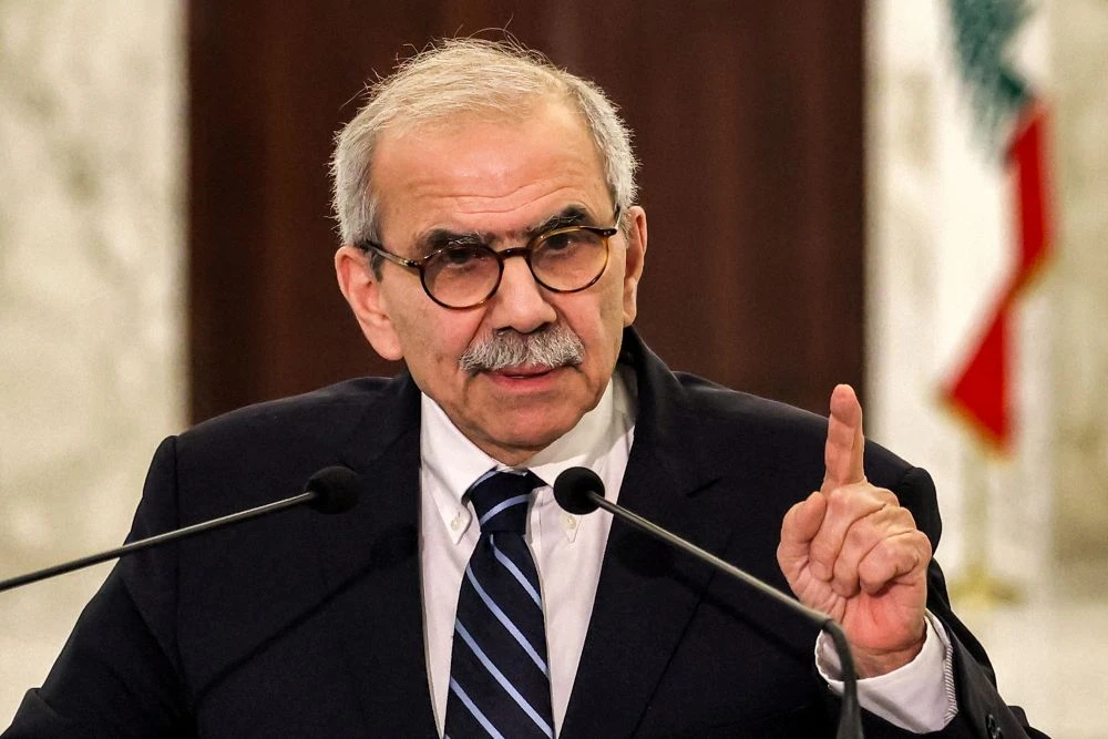 Lebanon’s new PM-designate Nawaf Salam delivers a statement at the presidential palace in Baabda, east of Beirut, Jan. 14, 2025. (AFP)