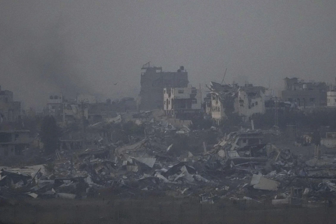 Destroyed buildings by Israeli bombardments as seen inside the Gaza Strip from southern Israel, Jan. 16, 2025. (AP)