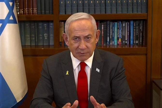 This image grab from handout video footage released by the Israeli Government Press Office (GPO) shows Prime Minister Benjamin Netanyahu giving a televised address in Jerusalem on January 18, 2025. (AFP)