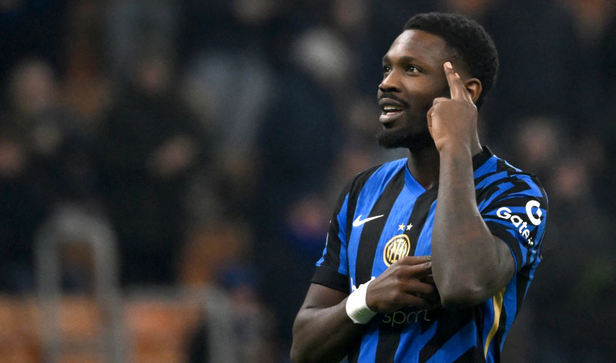 Inter Milan's French forward #09 Marcus Thuram celebrates scoring his team's third goal during the Italian Serie A football match between Inter Milan and Empoli at the San Siro Stadium in Milan on January 19, 2025. (AFP)