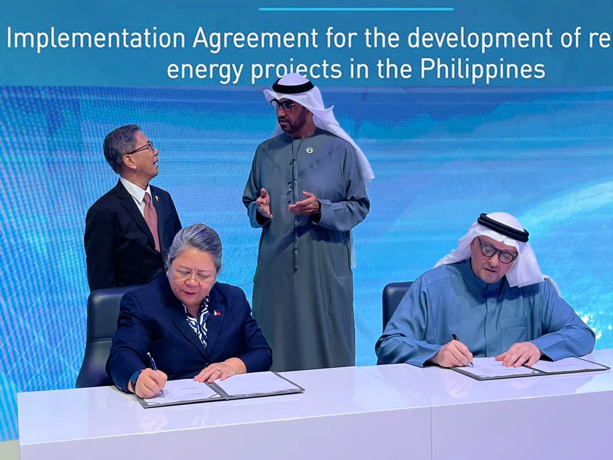 Philippines' Department of Energy Undersecretary Dr. Rowena Cristina L. Guevara and Masdar’s Chief Executive Officer Mohamed Jameel Al Ramahi sign an implementation agreement in Abu Dhabi on Jan. 15, 2025. (Department of Energy)