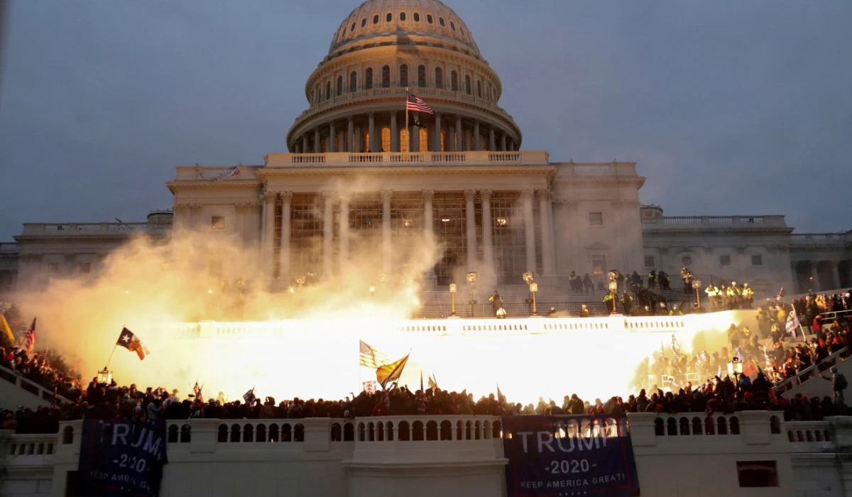 An explosion caused by a police munition is seen while supporters of U.S. President Donald Trump gather in front of the U.S. Capitol Building in Washington, U.S., January 6, 2021. (REUTERS file photo)
