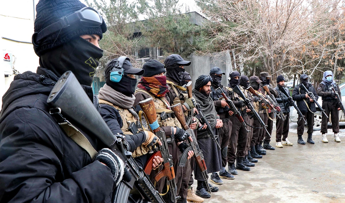 Taliban security personnel stand guard at the police headquarters in Ghazni on January 19, 2025. (AFP)
