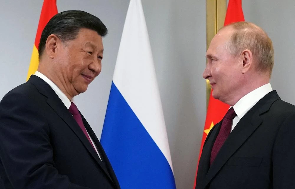 Chinese President Xi Jinping, left, and his Russian counterpart Vladimir Putin on Tuesday held a video call, Beijing’s state media reported. (AFP file photo)