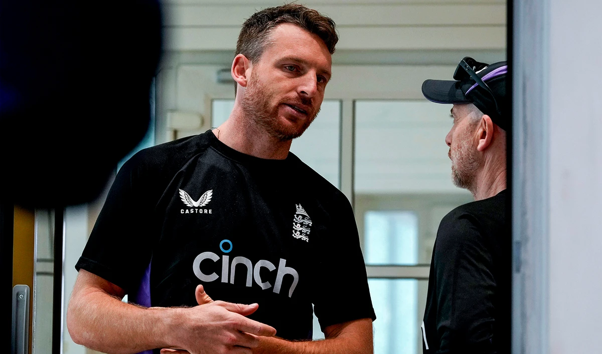 England captain Jos Buttler, left, talks with his media manager prior to attending a press conference ahead of their first Twenty20 cricket match against India, in Kolkata, India, on January 21, 2025. (AP)