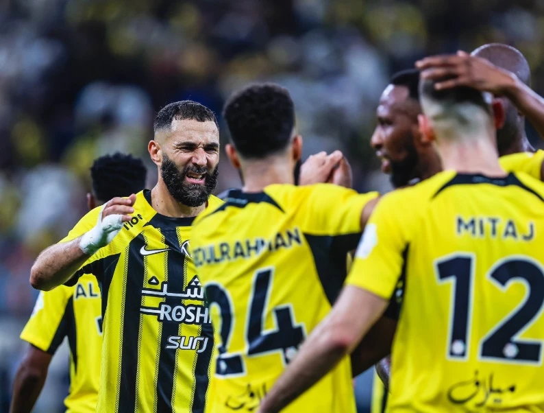 In-form Karim Benzema fired Al-Ittihad to a 2-1 win over Al-Shabab on Wednesday that puts the hosts back level with Al-Hilal at the top of the Saudi Pro League. (X/@ittihad_en)