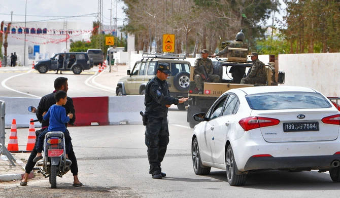 Police kill a man who set himself on fire outside a Tunisian synagogue
