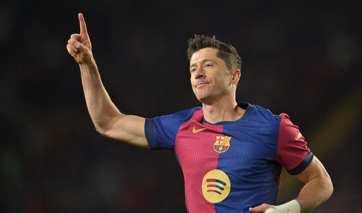 Barcelona's Polish forward #09 Robert Lewandowski celebrates scoring his team's sixth goal during the Spanish league football match between FC Barcelona and Valencia CF at the Estadi Olimpic Lluis Companys in Barcelona on January 26, 2025. (AFP)