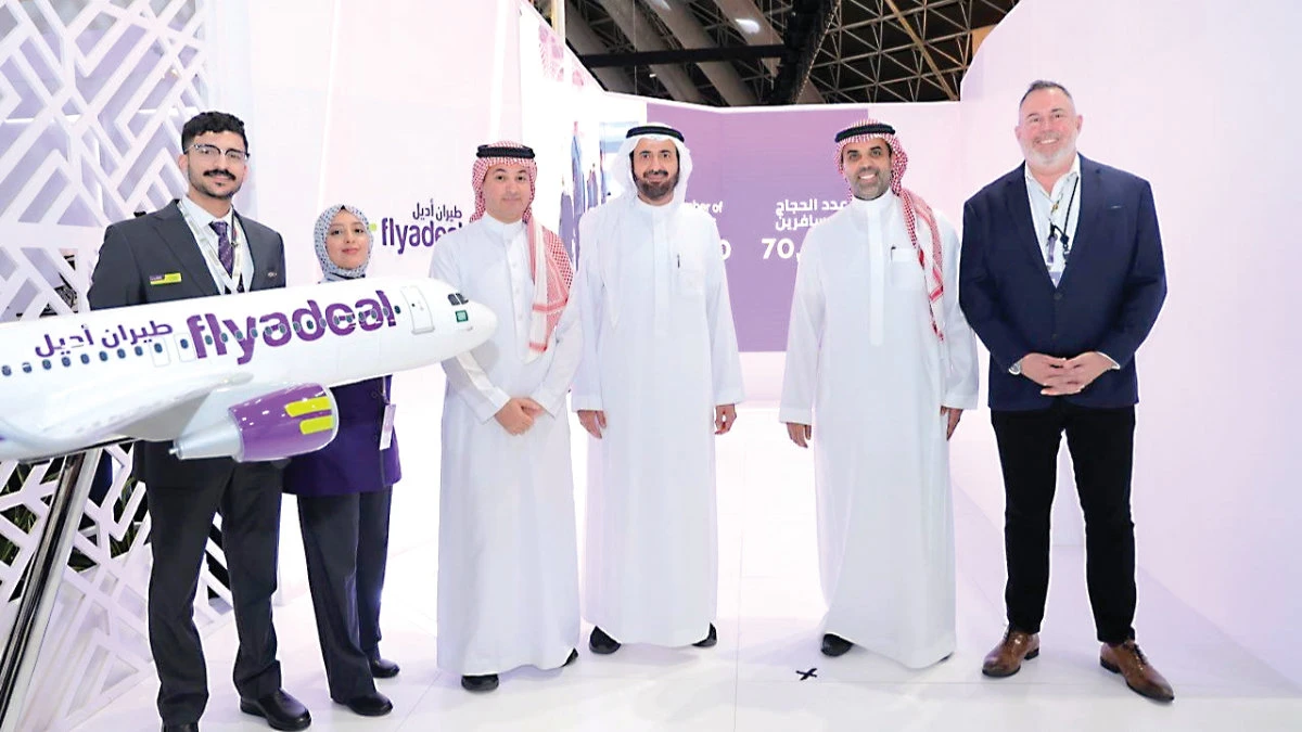 From right, Steven Greenway, CEO of flyadeal; Ibrahim Al-Omar, director general of Saudia Group; Dr. Tawfiq Al-Rabiah, minister of Hajj and Umrah; and Rakan Alotaibi, director of Hajj and Umrah and commercial regulatory affairs at flyadeal, along with with the airline’s cabin crew.