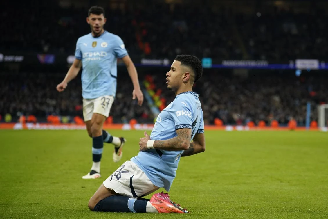 Manchester City's Savinho celebrates after scoring. (AP)
