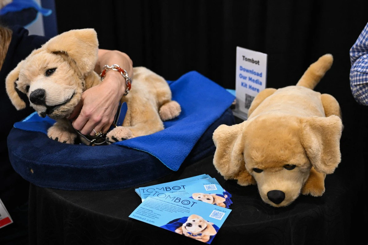 The Tombot Inc. hyper-realistic autonomous dog robot companion for the elderly and those unable to have a living pet dog is demonstrated during CES Unveiled ahead of the Consumer Electronics Show in Las Vegas, Nevada on January 5, 2025. (AFP)