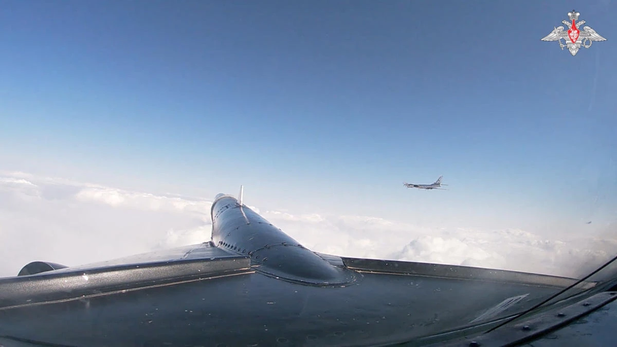 A Russian Tu-95 strategic bomber conducts flight over the neutral waters of the Sea of Okhotsk and Sea of Japan, in this still image from video released Jan. 30, 2025. (Russian Defense Ministry via Reuters)