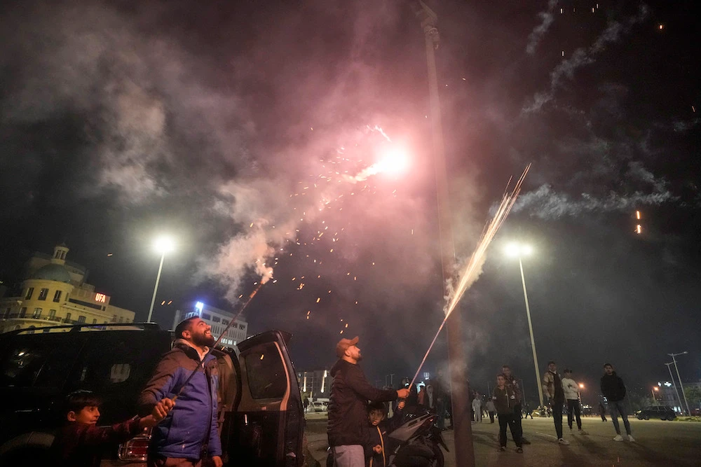 People celebrate on New Year's Eve in downtown Beirut, Lebanon, Wednesday, Jan. 1, 2025. (AP)