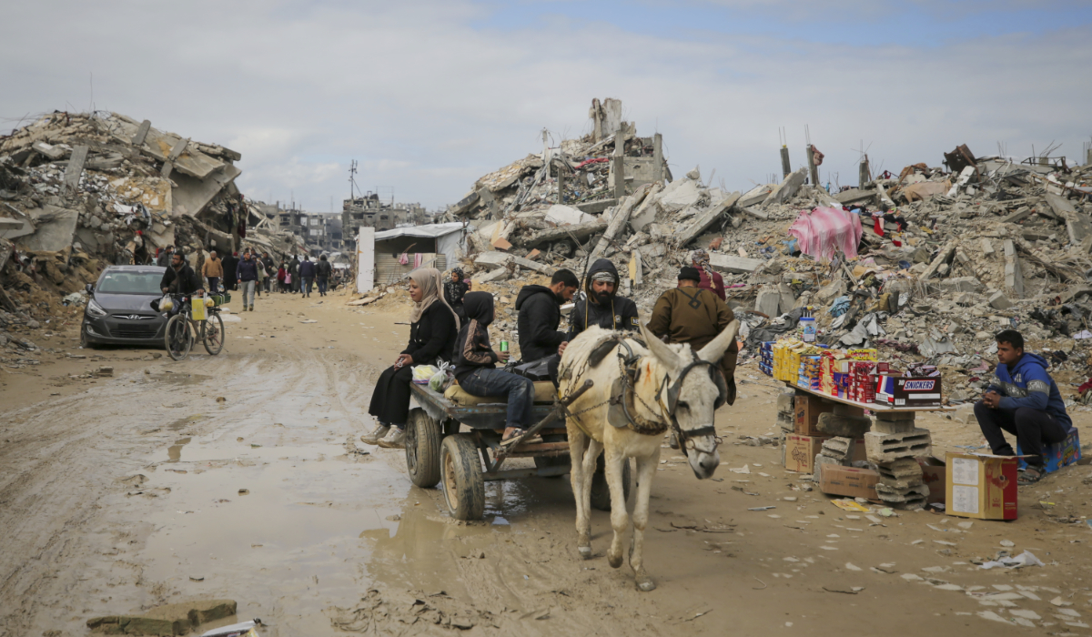 Palestinians riding a donkey cart in Gaza. (AP)