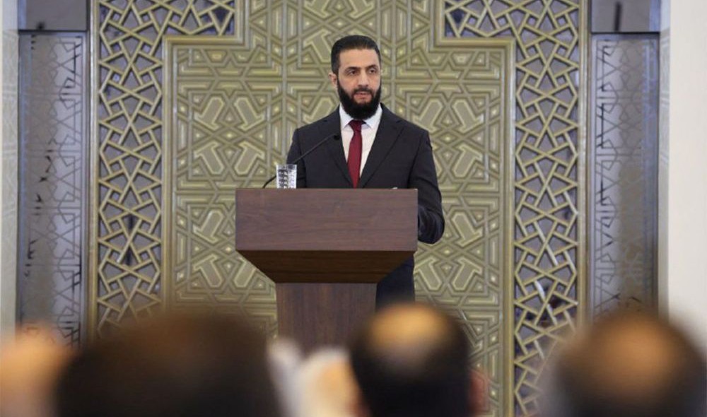 Ahmed Al-Sharaa addresses attendees at the National Dialogue Conference, Damascus, Syria, Feb. 25, 2025. (AFP)