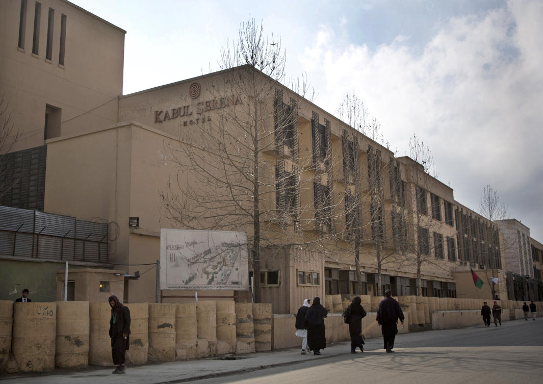 Afghans walk by the Serena hotel in downtown Kabul, Afghanistan, March 21, 2014. (AP/File Photo)