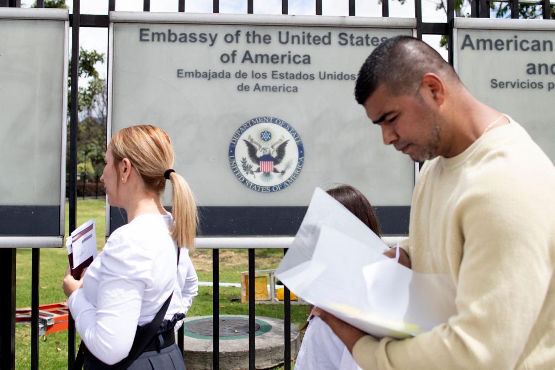 People queue to enter the US Embassy for their visa appointment in Bogota on January 31, 2025. The US Embassy in Colombia resumed issuing visas on January 31, almost a week after a high-profile social media spat between presidents Donald Trump and Gustavo Petro. (AFP)