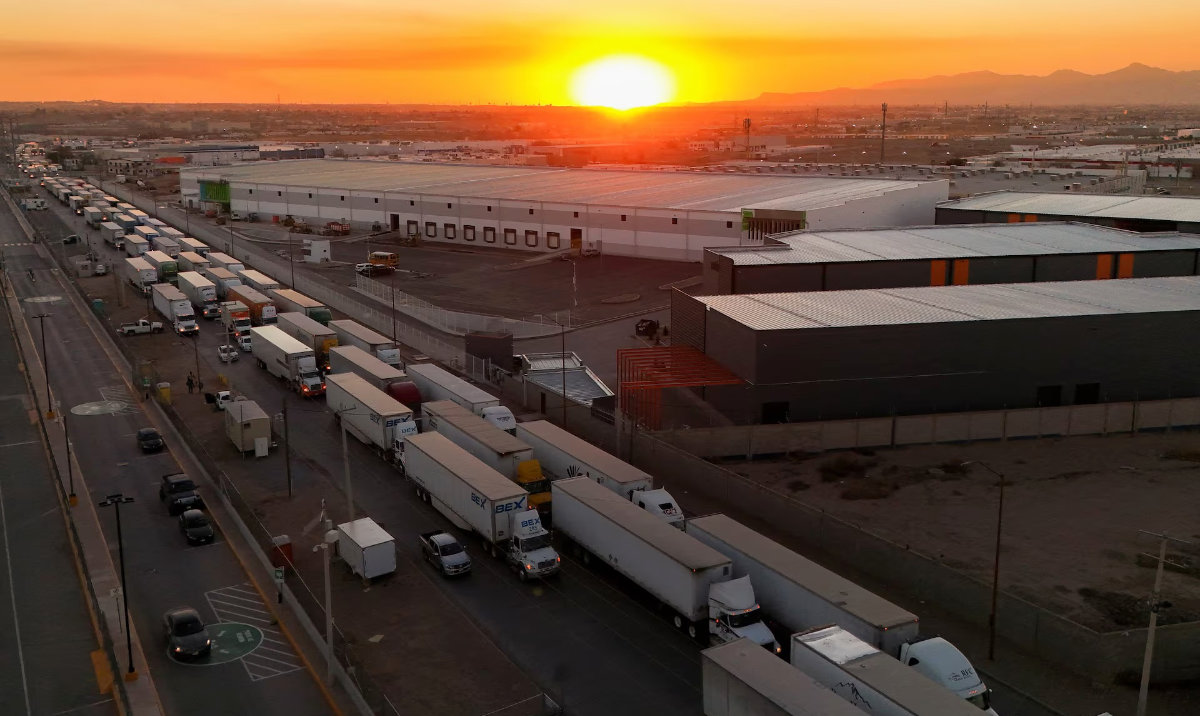 A drone view shows trucks waiting in line near the Zaragoza-Ysleta border crossing bridge to cross into the US, in Ciudad Juarez, Mexico January 31, 2025. (Reuters)