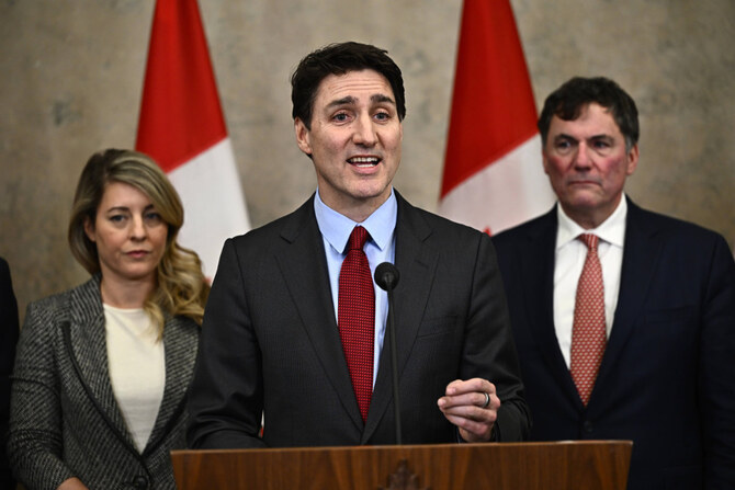 Canadian Prime Minister Justin Trudeau addresses media members in Ottawa, Canada, on Feb. 1, 2025, after US President Donald Trump signed an order to impose stiff tariffs on imports from Mexico, Canada and China. (The Canadian Press via AP)