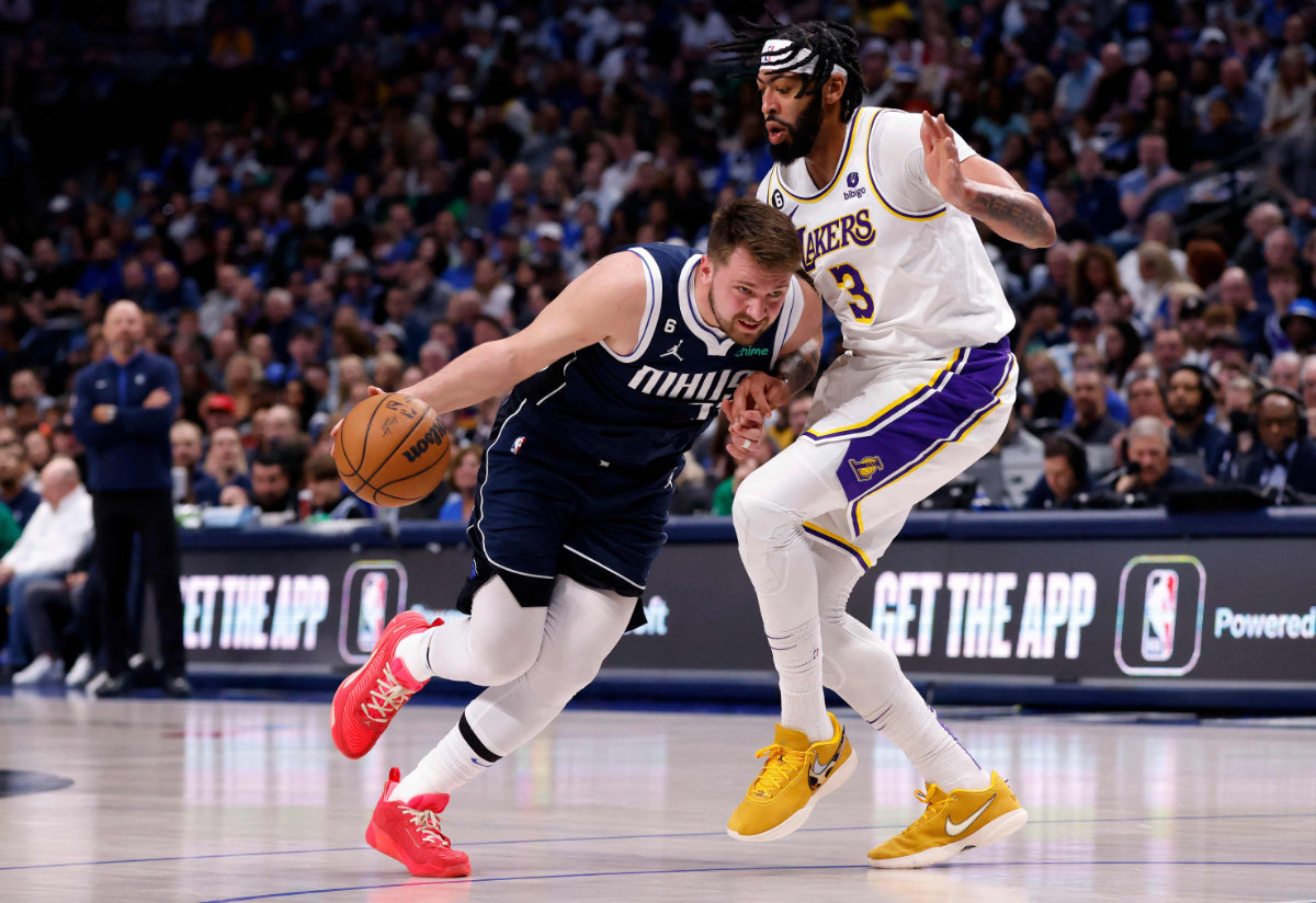 Luka Doncic of the Dallas Mavericks and Anthony Davis of the Los Angeles Lakers during an NBA game at American Airlines Center on Feb. 26, 2023 in Dallas. (AFP)