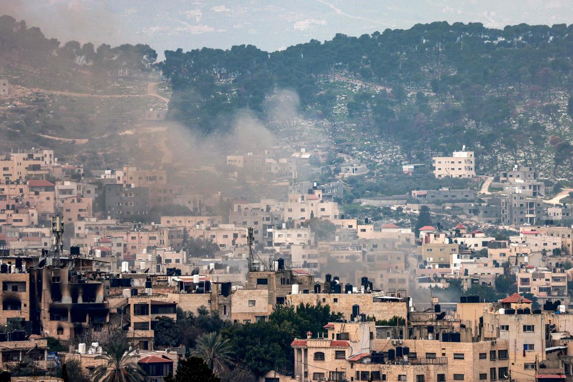 Smoke rises during an Israeli army operation in the Jenin camp for Palestinian refugees in the north of the occupied West Bank on February 3, 2025. (AFP)