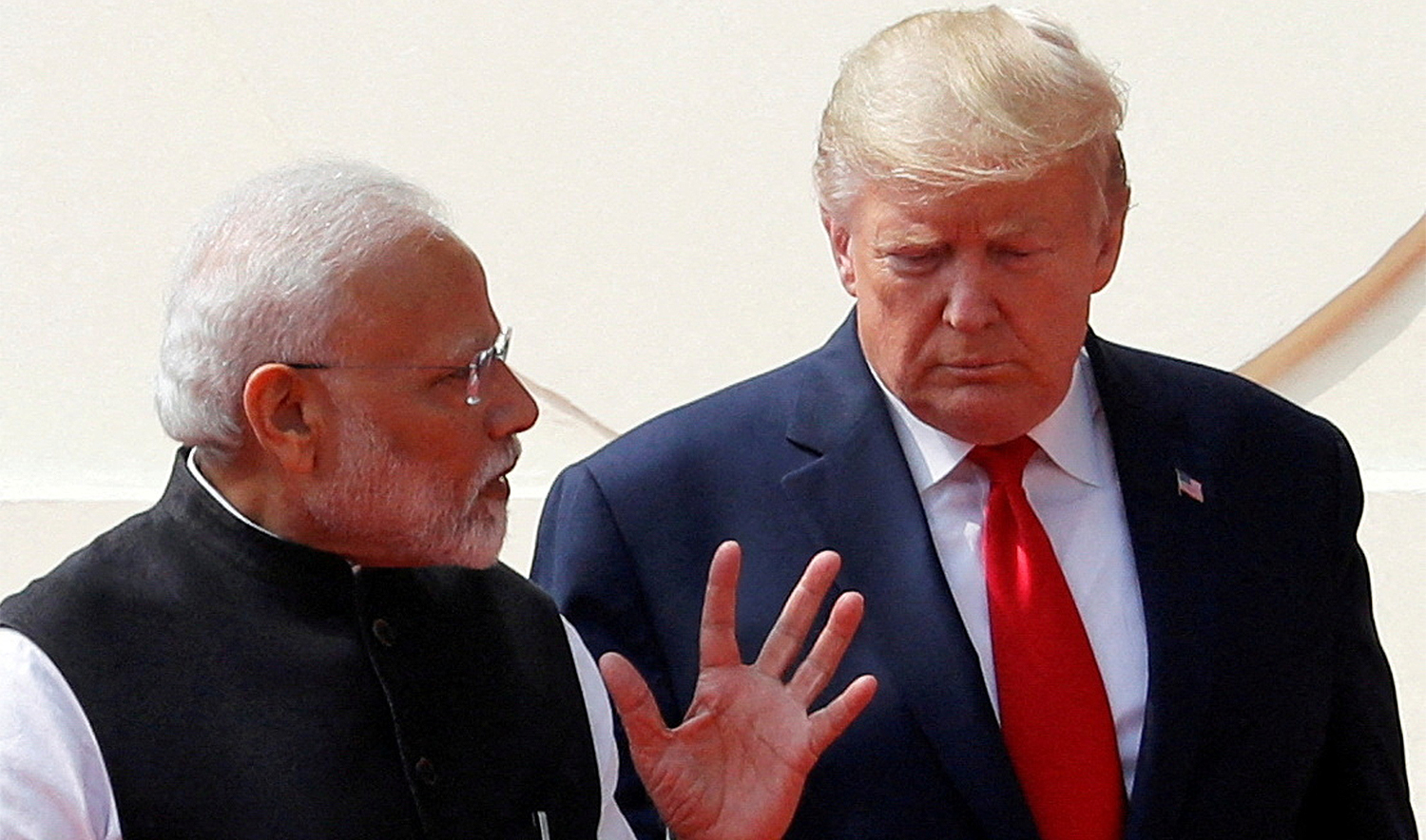 US President Donald Trump and India's Prime Minister Narendra Modi talk as they arrive for a joint news conference after bilateral talks at Hyderabad House in New Delhi, India, on February 25, 2020. (REUTERS/File)