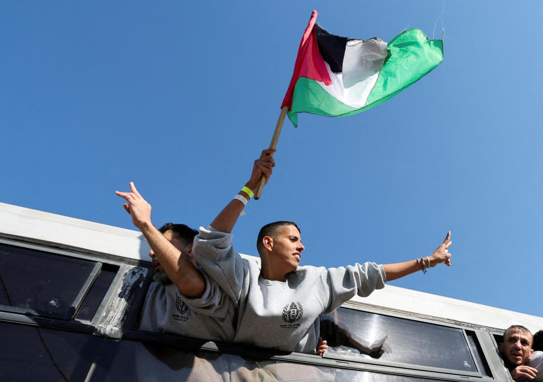 Above, freed Palestinian prisoners celebrate after being released by Israel as part of a hostages-prisoners swap in Khan Younis in the southern Gaza Strip on Feb. 1, 2025. (Reuters)