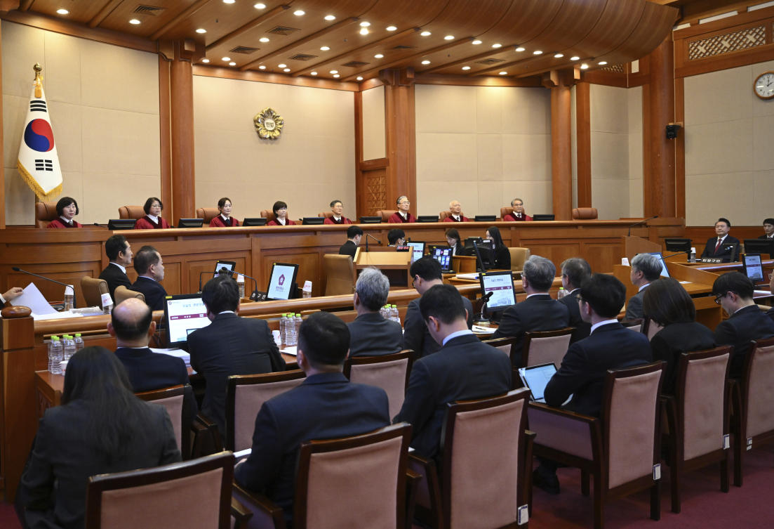 South Korea’s impeached president Yoon Suk Yeol, second right, attends a hearing in his impeachment trial at the Constitutional Court in Seoul on Feb. 4, 2025. (AP)