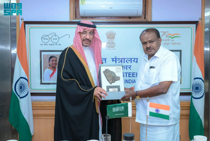 This handout photo, released by Saud Press Agency on February 3, 2025, shows Saudi Minister of Industry and Mineral Resources Bandar Alkhorayef with India’s Union Minister of Heavy Industries H.D. Kumaraswamy in New Delhi. (SPA)