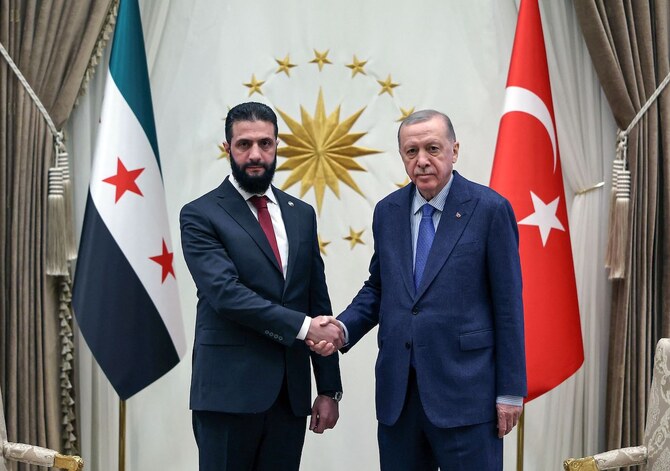 Turkish President Recep Tayyip Erdogan (R) meets with Syrian president Ahmed Al-Sharaa, at the Presidential Palace in Ankara. (AFP)