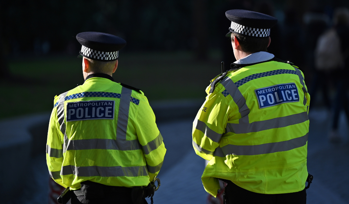 Metropolitan Police officers stand guard in central London, on January 21, 2023. (AFP)