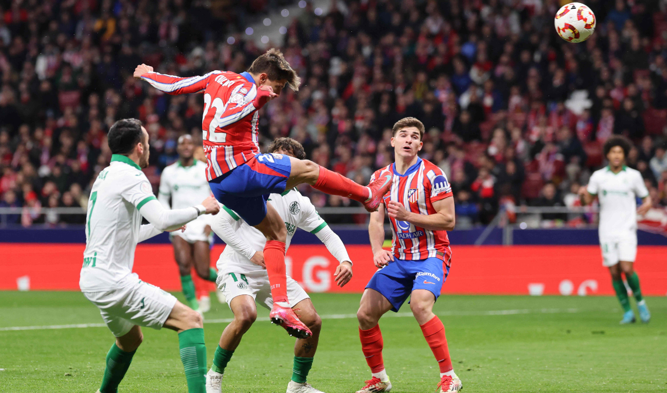 Atletico Madrid’s Argentine forward Giuliano Simeone heads the ball and scores the opening goal during the Spanish Copa del Rey (King’s Cup) quarterfinal first leg football match between Club Atletico de Madrid and Getafe CF at Metropolitano Stadium in Madrid on Feb. 4, 2025. (AFP)