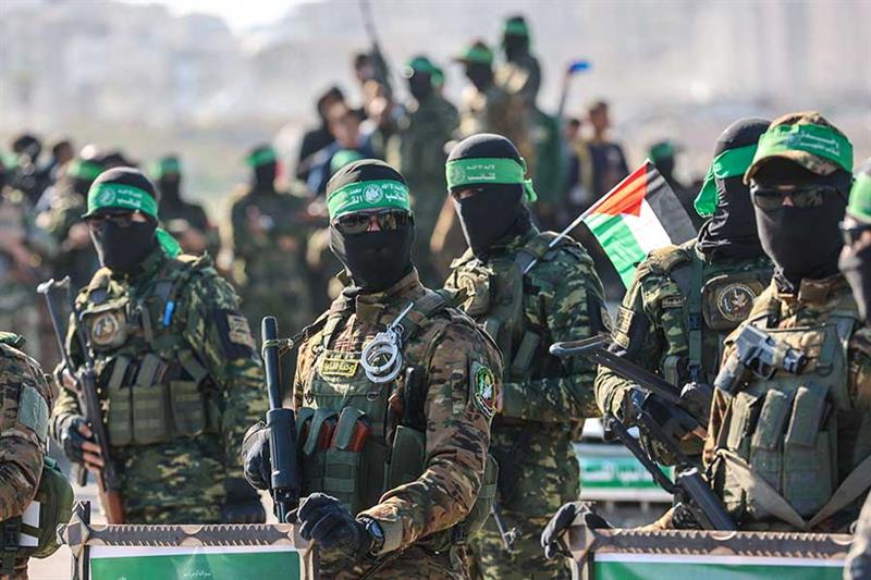 Hamas official Mousa Abu Marzouk said talks with US had become a necessity for his group, whose fighters were seen securing areas during recent Israeli hostage handovers in Gaza. (AFP/File)