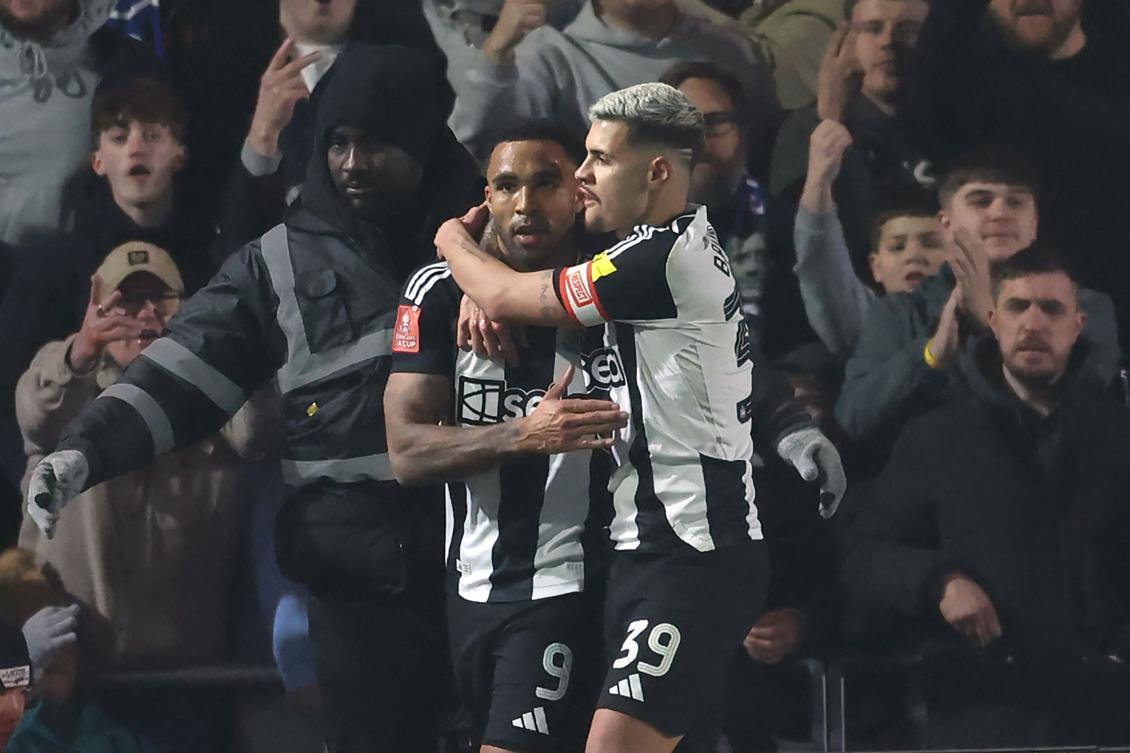 Newcastle United’s English striker Callum Wilson celebrates with Brazilian midfielder Bruno Guimaraes after scoring their second goal during their English FA Cup fourth round match against Birmingham City at St. Andrew’s @ Knighthead Park in Birmingham, on Feb. 8, 2025. (AFP)