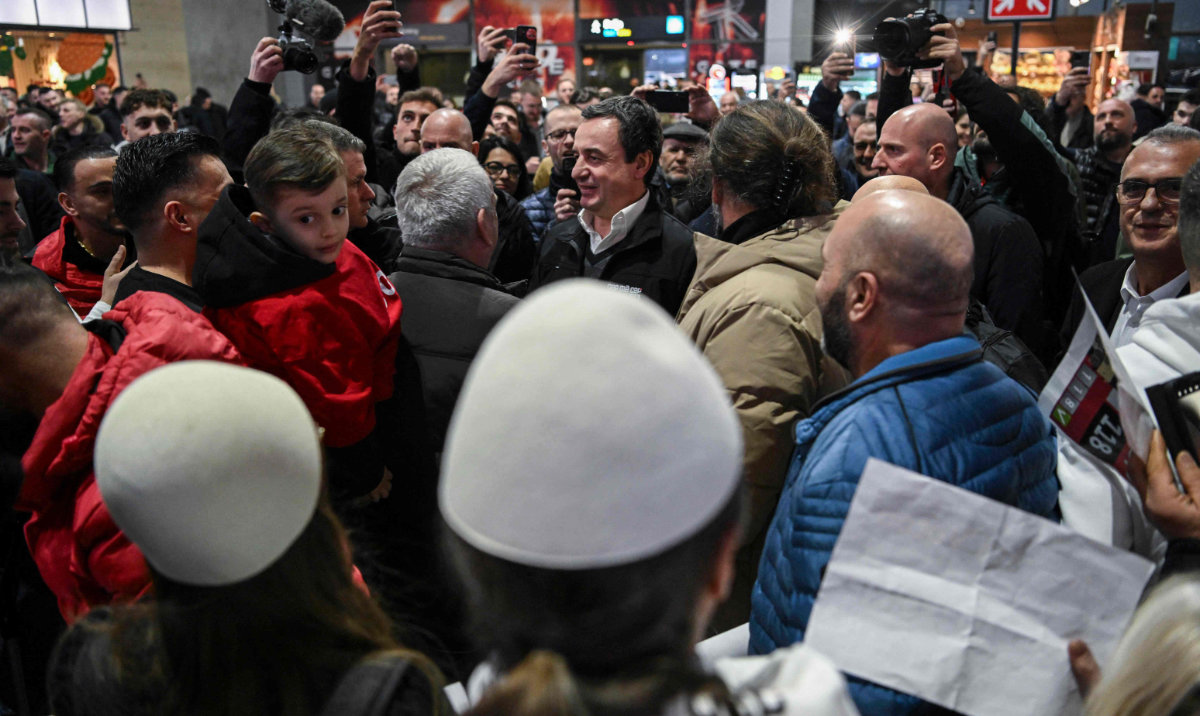 Kosovo's current Prime Minister Albin Kurti (C) welcomes diaspora supporters of the Vetevendosje (Self-determination) leftist party on the eve of parliamentary elections, at the Adem Jashari International airport, southwest of the capital Pristina on February 8, 2025. (AFP)