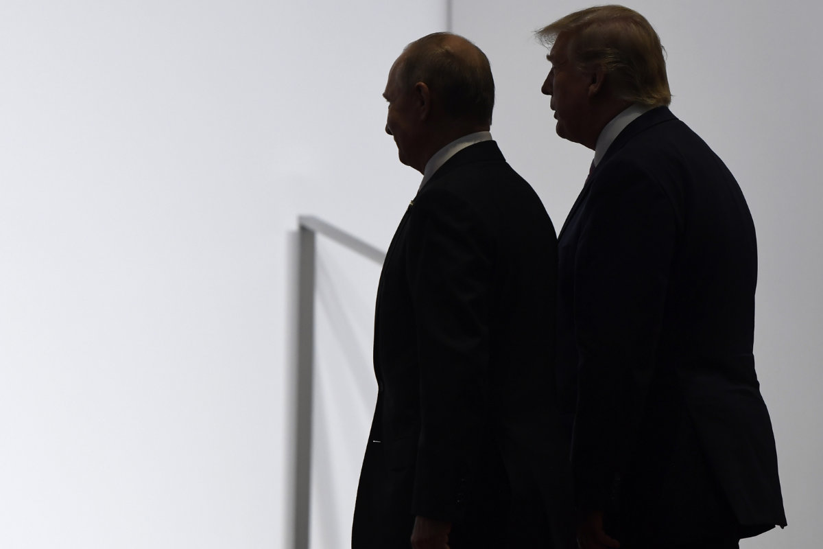 President Donald Trump and Russian President Vladimir Putin walk together at the G20 summit in Osaka, Japan, on June 28, 2019. (AP/File)